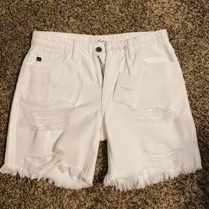 KanCan mid-length white shorts. Size medium.